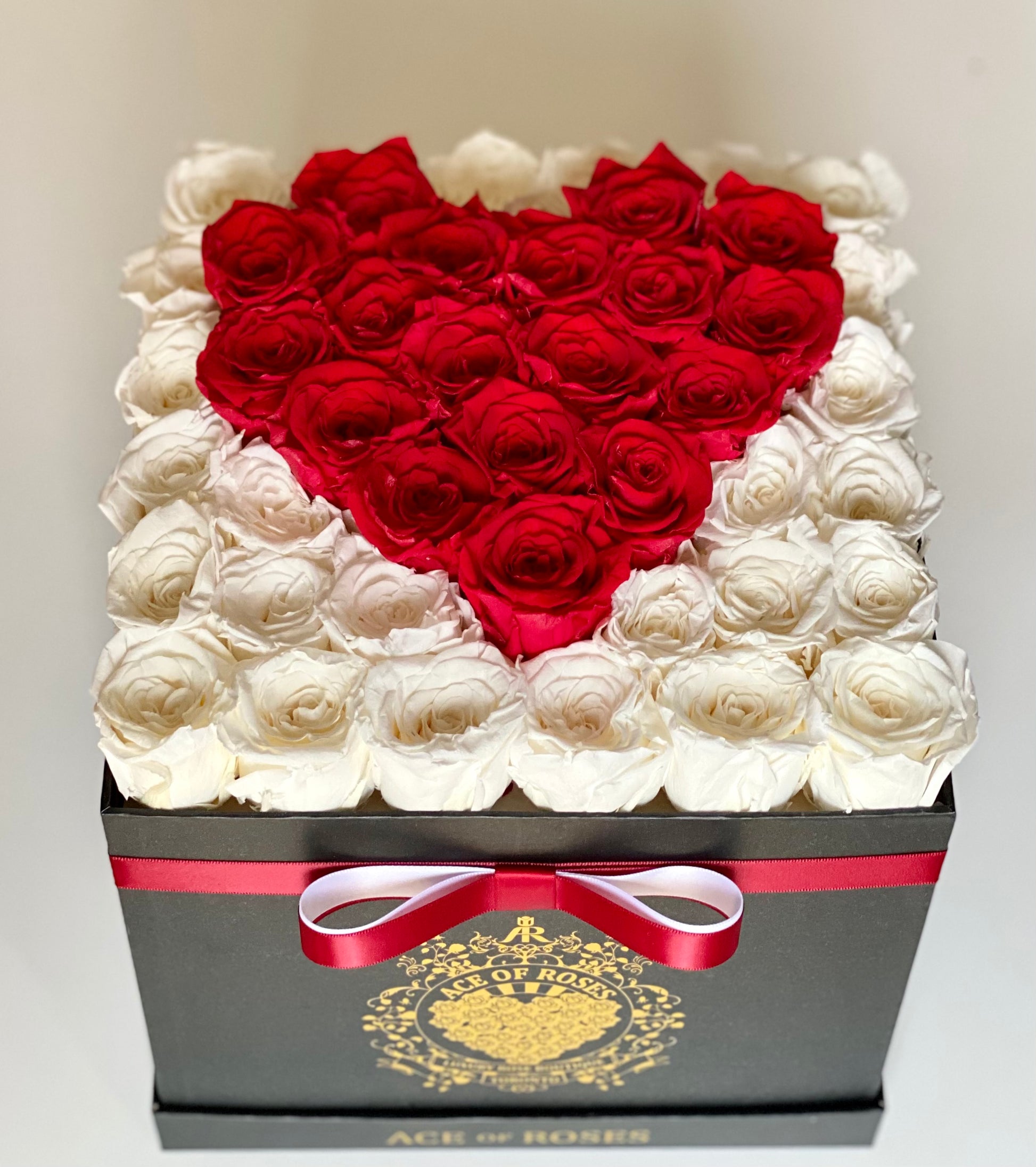 white heart shape box roses